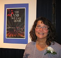 Alison with the poster of her winning book at the 2008 Saskatchewan Book Awards.